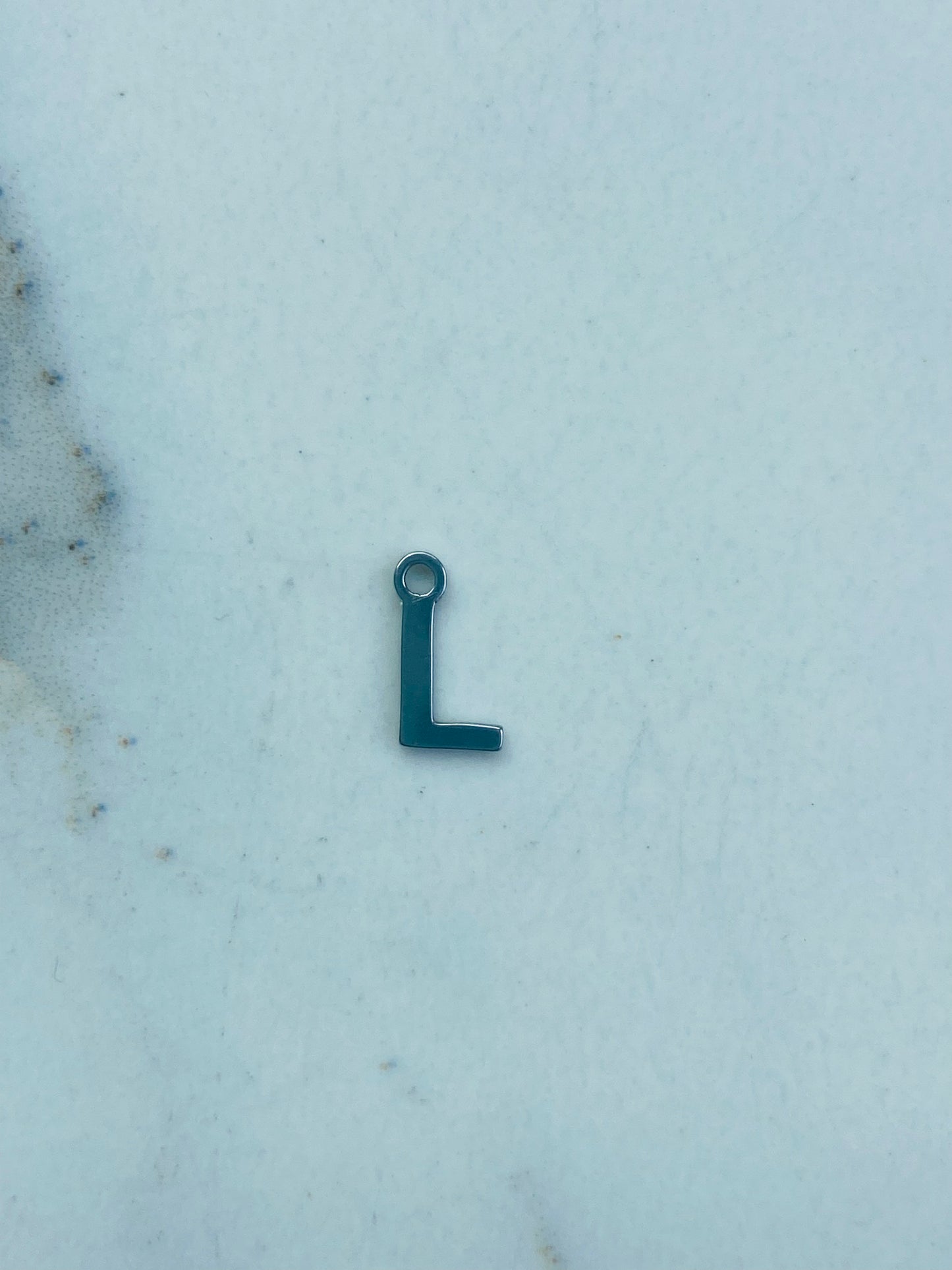 Bedel letter L zilver